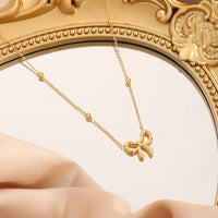 Bow Necklace / Gold