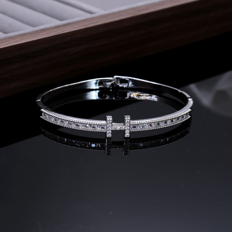 Iconic 'H' Hinged Crystal Bangle