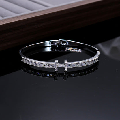 Iconic 'H' Hinged Crystal Bangle